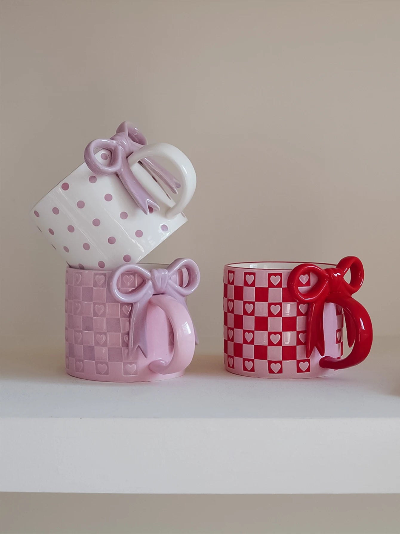 Taza de cerámica con forma de corazón con mango de lazo, taza de café con diseño de mango de lazo creativo, adecuada para decoración del hogar, agua potable diaria, leche de desayuno, té de la tarde, café, cafetería,