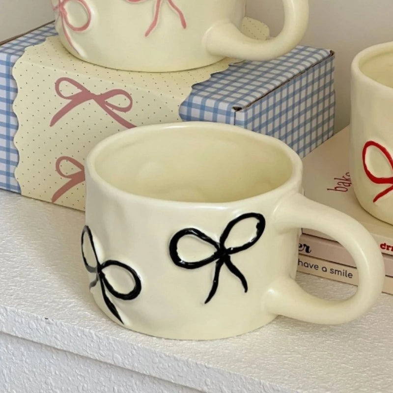 Taza con forma de lazo para niñas de aspecto alto, taza de agua de cerámica para el hogar