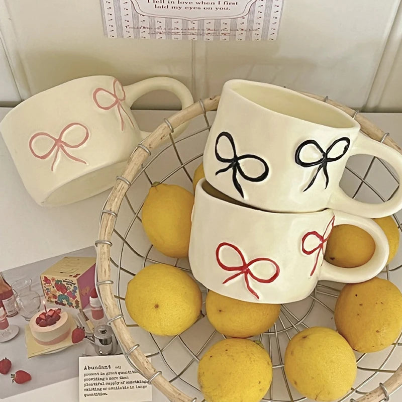 Taza con forma de lazo para niñas de aspecto alto, taza de agua de cerámica para el hogar