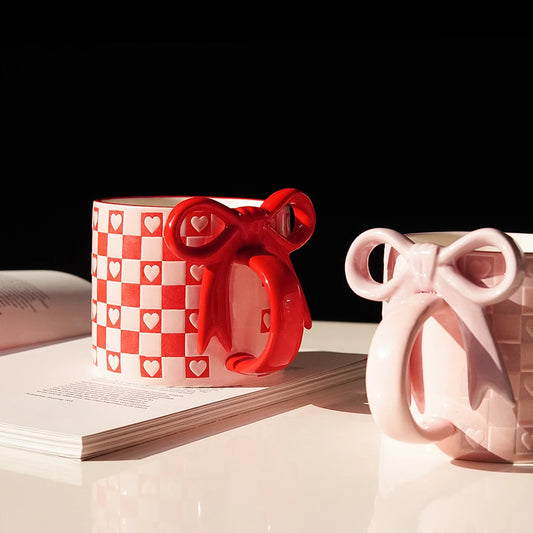 Taza de cerámica con forma de corazón con mango de lazo, taza de café con diseño de mango de lazo creativo, adecuada para decoración del hogar, agua potable diaria, leche de desayuno, té de la tarde, café, cafetería,